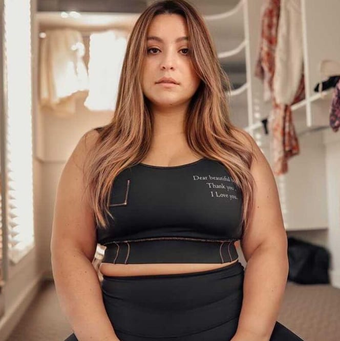 Eco-Luxe  or Eco-Lux Recycled Polyester active wear fabric, these women’s 2-in-1reversible sports-bra or top are super soft, with a stunning matte black look, Double lined, triangle stitching,  Size Inclusive, Sports wear, Gym Enthusiast, Yoga, Pilates, Fitness Fanatic, High-End, Plus -size, Eco-friendly, Organic, Stylish, Classic, Premium, Sacred Circus, Tight-fit, High-stretch, running, Everyday wear, comfortable, high-quality. 