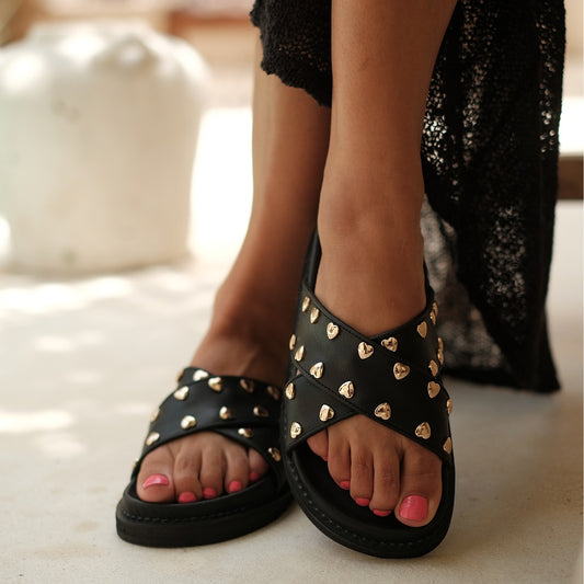 Paris Slides for Women, two leather straps, delicately decorated in golden hearts, Handmade in Bali, Pre-order, Shop for a Cause, Support SMEs, Love Local, Sustainable Fashion, Sacred Circus, Comfort, Stylish, Genuine Leather, Statement, Casual look, High-end, Footwear, Sturdy, True to Size. 