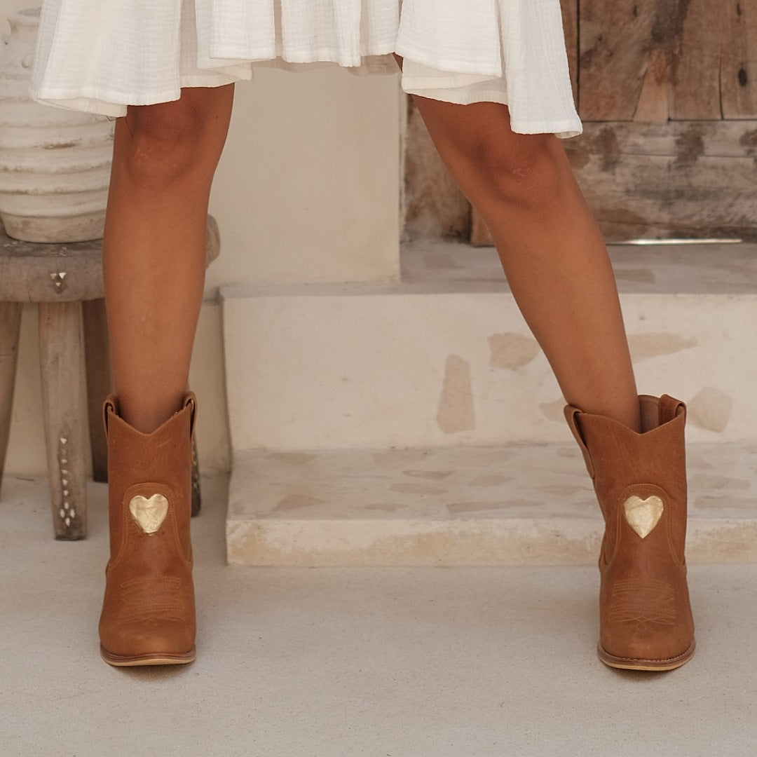 Meenas Booties Wide Ankle Slip On, Brown Botties, Handmade in Bali, Western Style, Pre-order, Shop for a Cause, Support SMEs, Love Local, Sustainable Fashion, Sacred Circus, Customizable, Comfort, Stylish, Luxe, Staple in Every Fashion, Extra Edge, High-end, Premium, Adventure, Statement, Footwear, Sturdy, True to Size, Embroidery, Gold heart in the Center, Personalized, Leather Material.