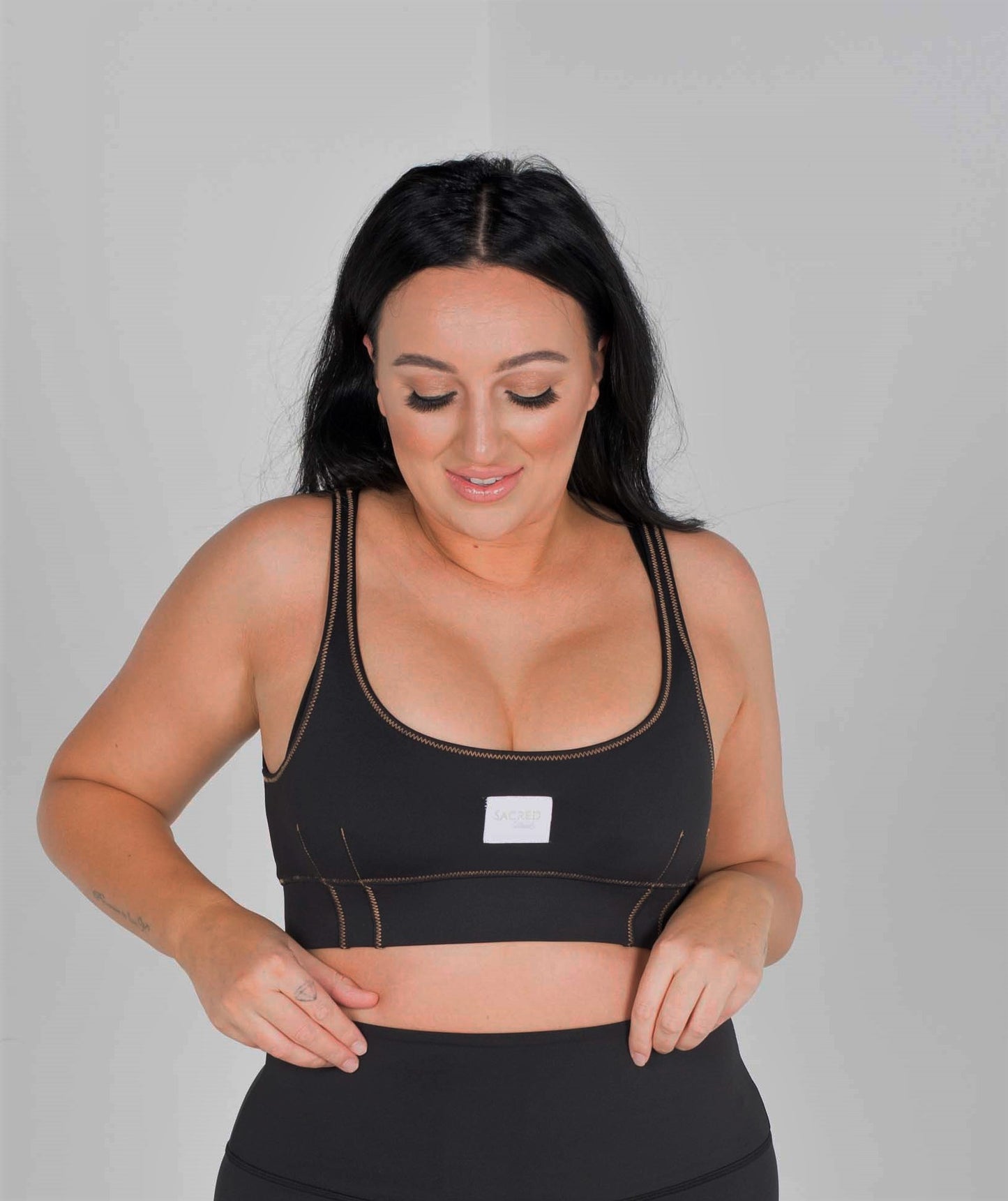Eco-Luxe  or Eco-Lux Recycled Polyester active wear fabric, these women’s 2-in-1reversible sports-bra or top are super soft, with a stunning matte black look, Double lined, triangle stitching,  Size Inclusive, Sports wear, Gym Enthusiast, Yoga, Pilates, Fitness Fanatic, High-End, Plus -size, Eco-friendly, Organic, Stylish, Classic, Premium, Sacred Circus, Tight-fit, High-stretch, running, Everyday wear, comfortable, high-quality. 